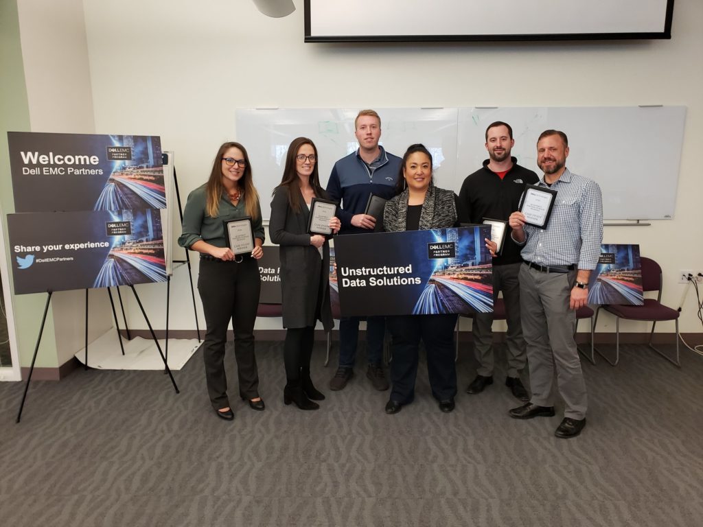 Hunter McBain and his team winning the case study challenge for Unstructured Data Solutions with Dell EMC.