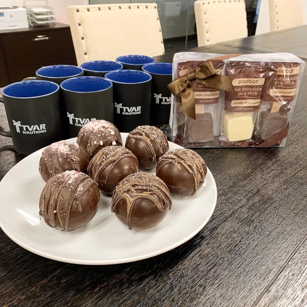 Peppermint Hot Chocolate Bombs, Sea Salt Caramel Hot Chocolate Bombs, Hot Chocolate on a Stick, and TVAR Solutions Mugs